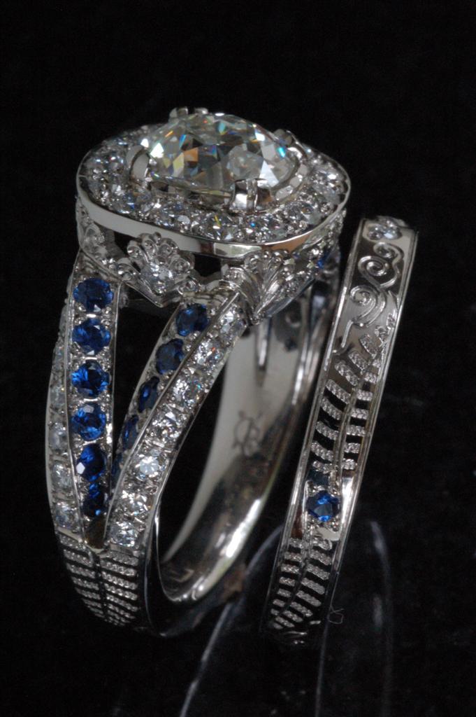 This pure Palladium Sapphire and Diamond EngagementWedding Band Suite was